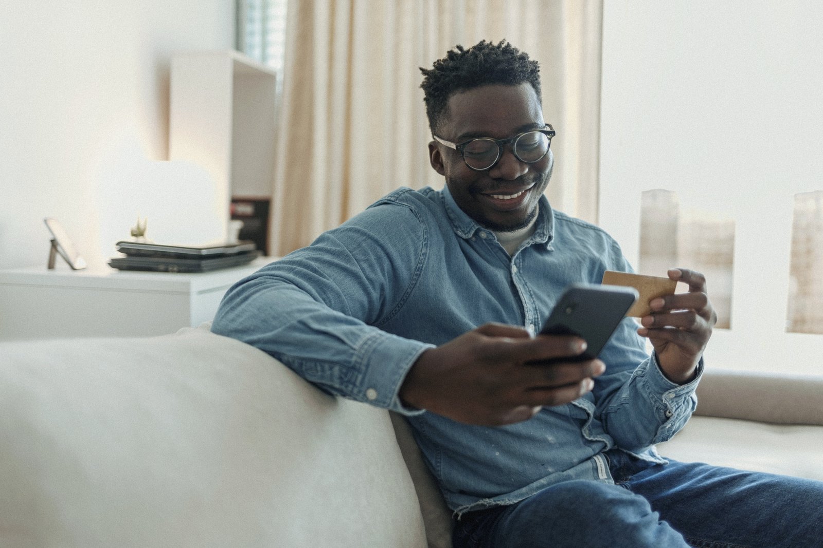 Man paying by phone with his card